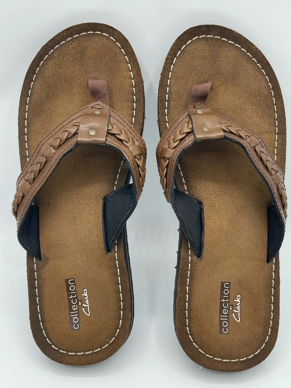 Clarks Collection Women’s Brown Braided Leather Toe-Post Sandals.